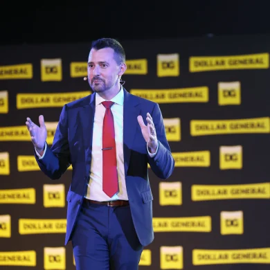Josh Fletcher mentalist performing on stage at a Dollar General corporate event